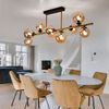 LED Deckenleuchte, Kugeln, Glas amber, messing, L 87 cm Bild 4
