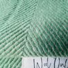 WoolOnly Wolldecke Plaid mit Fransen 130x180 cm, Herringbone Mint-natur Bild 2