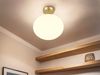 Kleine Retro LED Deckenleuchte Messing mit Glaskugel, Ø 30cm Bild 5