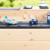 roba Sandkasten Street & Play aus Holz - Design mit Straße, Kochplatte, Spielwanne - Sandkiste groß mit Abdeckungen aus wetterfestem Holz - Natur / Schwarz Bild 4