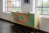 KAWOLA Sideboard LAGO 4 Türen Glas grün Fuß Edelstahl goldfarben 85 x 40 x 180 cm Bild 1