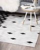 Teppich Kuhfell weiß / schwarz 140x200 cm Patchwork Kurzflor MALDAN Bild 3