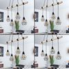»Fornacelle« 4-flammige Hängelampe aus Metall und Holz in Schwarz/Natur, Modernes Design mit schirmen in Gitter-Optik, Höhe der Leuchtköpfe beliebig verstellbar, 4 x E27 max. 60 Watt Bild 2