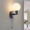 Lindby Wandleuchte Zaniba, Metall, Schwarz IP44, 1x8 W LED Bild 1