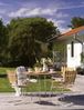 Gartenstuhl Classic mit Armlehne von Brafab, aus Teak und Metall, skandinavisch, natur, Outdoor Bild 2