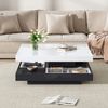 Couchtisch 70x70x36 cm mit 360° drehbarer Platte in Weiß/Schwarz Bild 1
