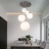 Elegante LED Hängeleuchte mit 5 Opal-Glaskugeln Bild 2