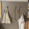 Calicosy 'SAMARA' Wandgarderobe mit 9 Haken aus goldfarbenem Metall H64 cm - Golden Bild 2