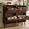 Schuhschrank in Walnussoptik mit Klapptüren, zweistöckigem Stauraum, Massivholzbeinen und skandinavischem Design Bild 5