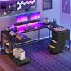 YITAHOME Gaming Tisch mit Steckdosen & LED-Lichter, Computer Schreibtisch mit Schubladen & Stauraum, Reversibler Eckschreibtisch mit Regalen, Computertisch für Home Office, 158x100 cm, Schwarz Bild 2
