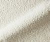 Drehstuhl Alja-Flex mit Armlehnen Teddystoff Beige Kreuzgestell breit Edelstahl 360° drehbar Wippfunktion Taschenfederkern Bild 5