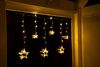 Spetebo Lichtervorhang LED Sternen Lichtervorhang warm weiß - 63 LED, 100 cm - Deko Lichterkette mit 63 LED für Innen Bild 4