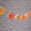 Lights4fun LED-Lichterkette 10er LED Solar Lichterkette Rattan Kugeln bunt Bild 2