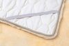 Matratzenauflage Medizinische Bettauflage Lammfell Patchwork MED-BETT-P 70x140cm Reissner Lammfelle Bild 2