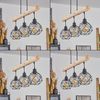 hofstein Pendelleuchte »Torano« Hängelampe aus Metall/Holz in Schwarz/Natur, ohne Leuchtmittel, 3xE27, höhenverstellbare in Gitter-Optik Bild 4