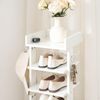 Schuhregal weiß, vertikale Schuhablage 9-stufig, schmaler Schrank mit Zaun und Bild 5