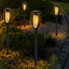 8er Set LED Solarleuchten, schwarz, Feuereffekt, H 50 cm Bild 5