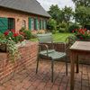 Gartenstuhl KARL mit Armlehne - 57x57x82cm, Kunststoff, Oliv | Stapelstuhl Loungestuhl Garten Outdoor-Stuhl Bild 3
