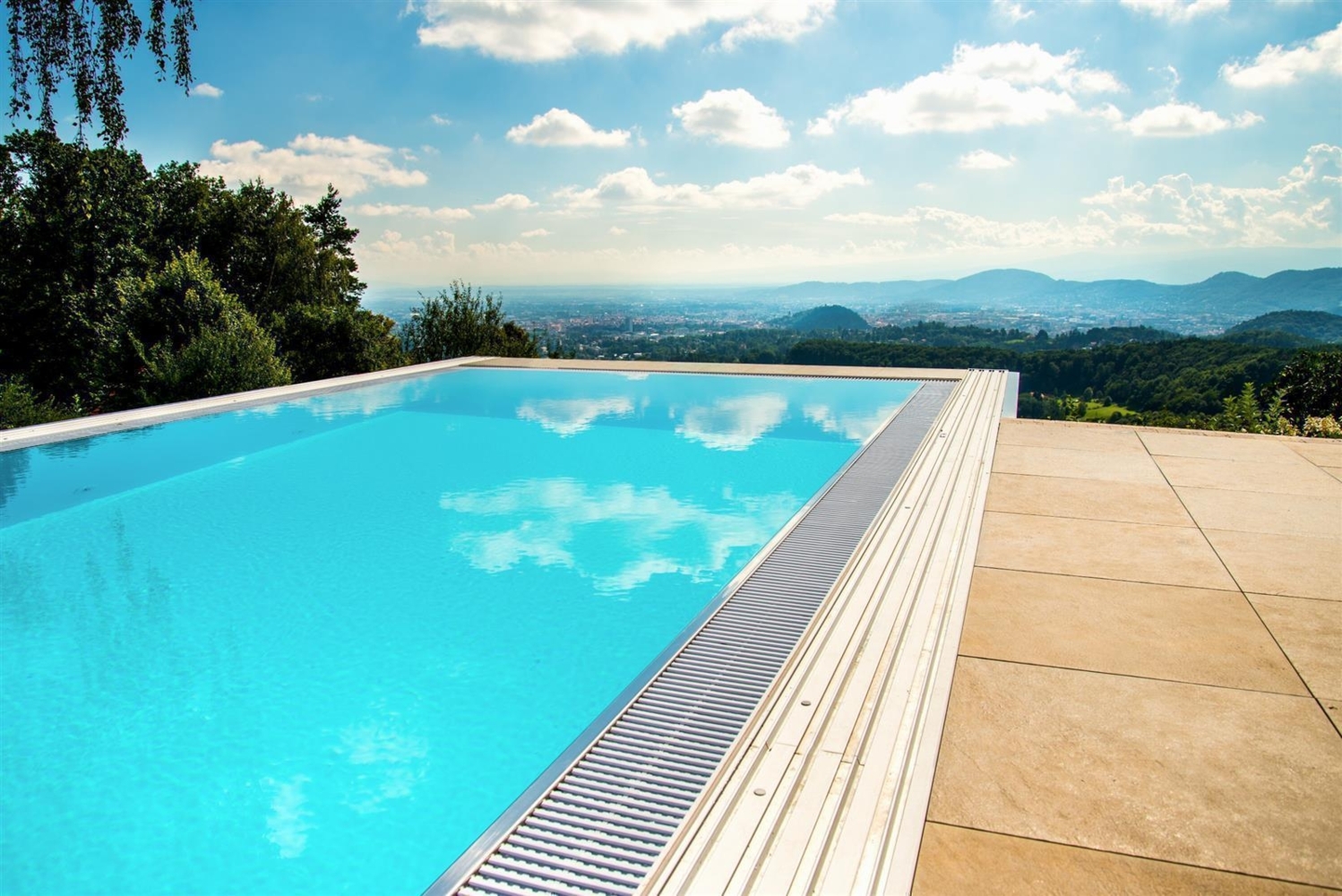 PP-Pool mit Überlauf | 6,42 x 3,42 x 1,50m Blau Treppe über gesamte Poolbreite Bild 1