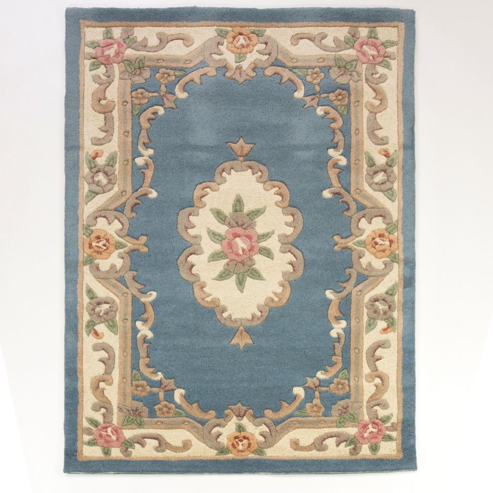 Kadima Design Traditioneller Wollteppich "Beauly" mit Handgeschnitzten Details. Farbe: Blau-Beige, 150x240 cm Bild 1