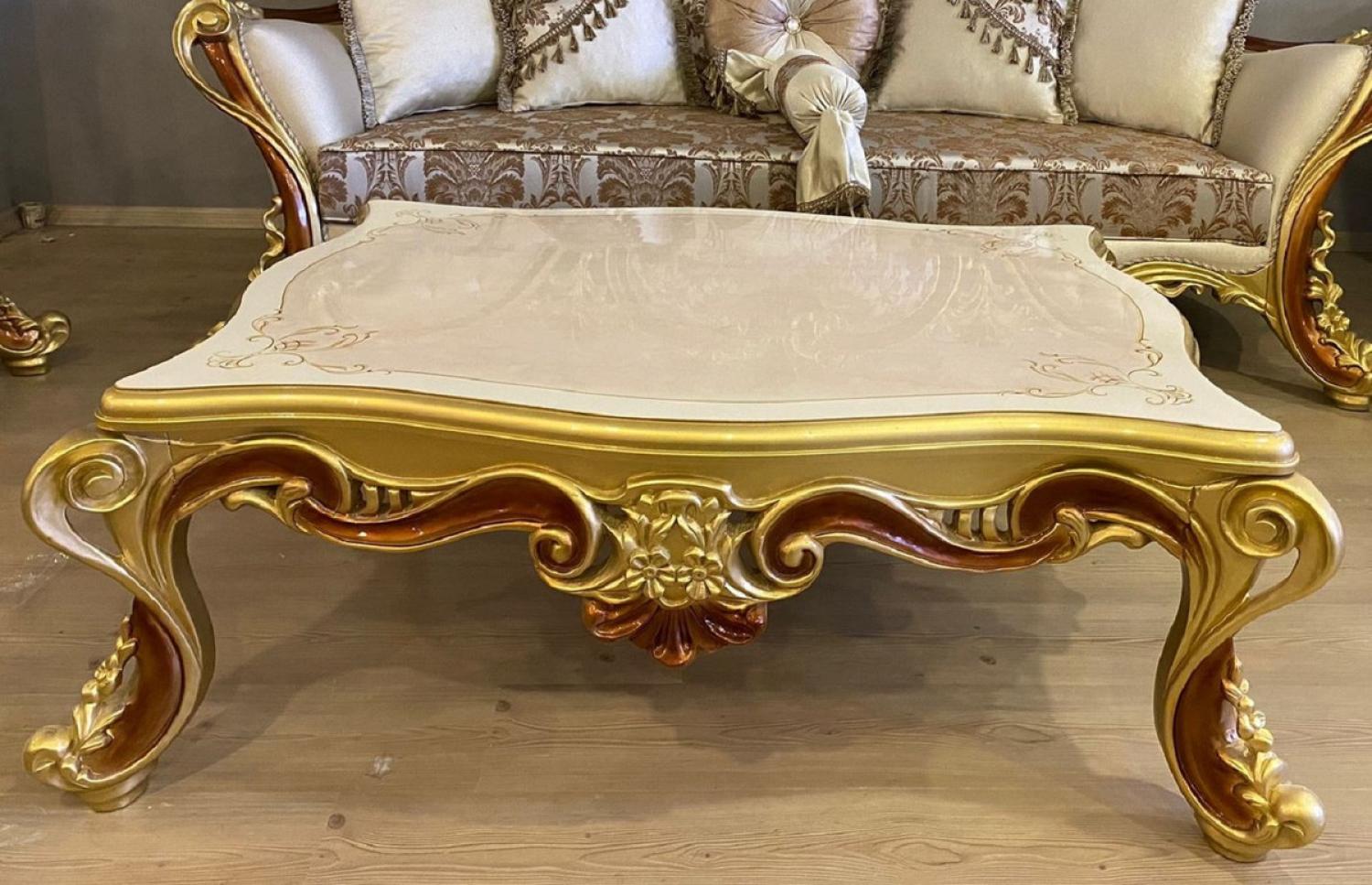 Casa Padrino Luxus Barock Couchtisch Weiß / Beige / Gold / Braun - Prunkvoller Wohnzimmertisch im Barockstil - Luxus Wohnzimmer Möbel im Barockstil - Barock Möbel - Barock Wohnzimmer Einrichtung Bild 1