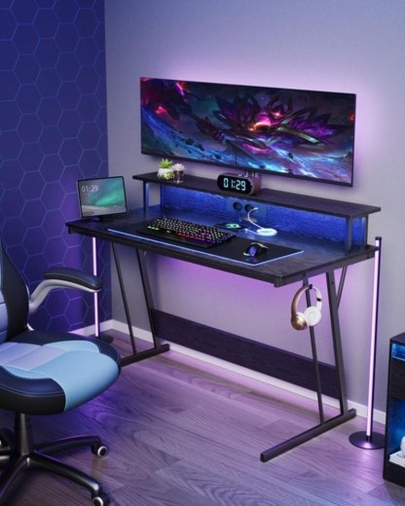 Vasagle Schreibtisch, Gaming Tisch mit eingebauter Steckdosenleiste, Computertisch, mit Monitorständer für 2 Monitore, Schlafzimmer, 55 x 135 x 76 cm, ebenholzschwarz LWD117B01 Bild 1