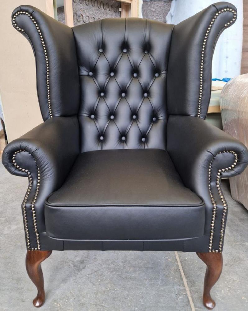 Casa Padrino Luxus Chesterfield Ohrensessel Schwarz / Dunkelbraun 98 x 90 x H. 110 cm - Echtleder Chesterfield Wohnzimmer Sessel - Wohnzimmer Möbel - Chesterfield Möbel - Luxus Leder Möbel Bild 1