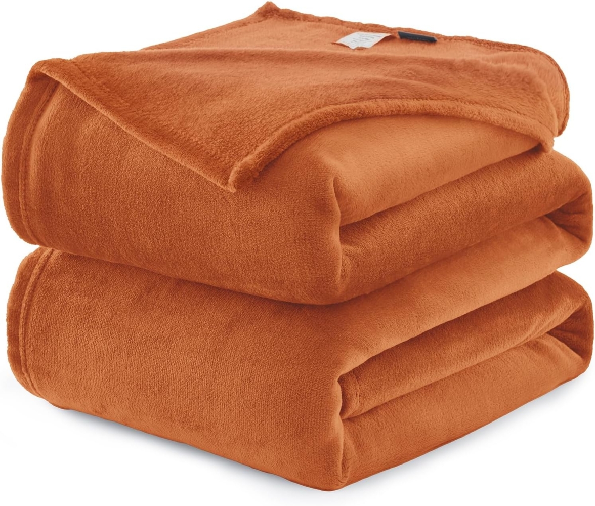 WAVVE Kuscheldecke Flauschig Decke Fleecedecke - Sofadecke 150x200 cm Warm Wohndecke Couchdecke, Orange Decke Weich Sofaüberwurf XL Bild 1
