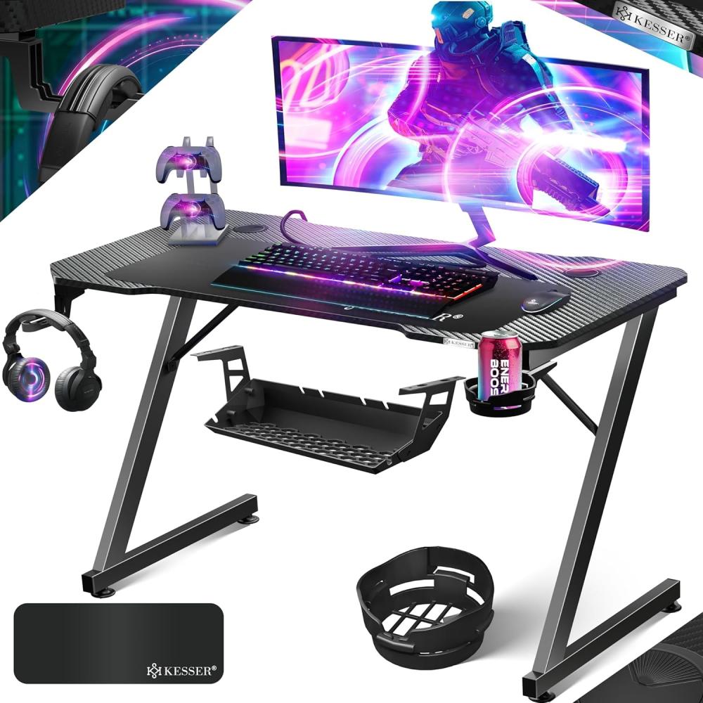 KESSER® Gaming Tisch LED | Z-Form Gamer Schreibtisch | Kopfhörerhaken & Kohlebeschichtung | Ergonomischer PC Computertisch | Stabiler Tisch mit Mauspad & Getränkehalter 120 x 60 cm, Schwarz Carbon Bild 1