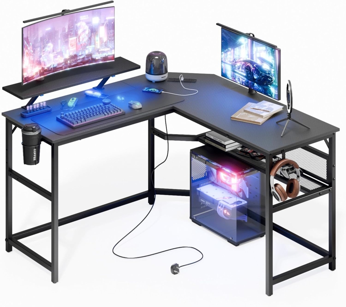 Mondeer L-förmiger Schreibtisch mit LED, 130x130 cm Gaming Tisch mit 2 Steckdosen und 2 USB Ladeanschluss, Eckschreibtisch mit Netzablage & Haken, für Home Office und Schlafzimmer, Carbon Schwarz Bild 1