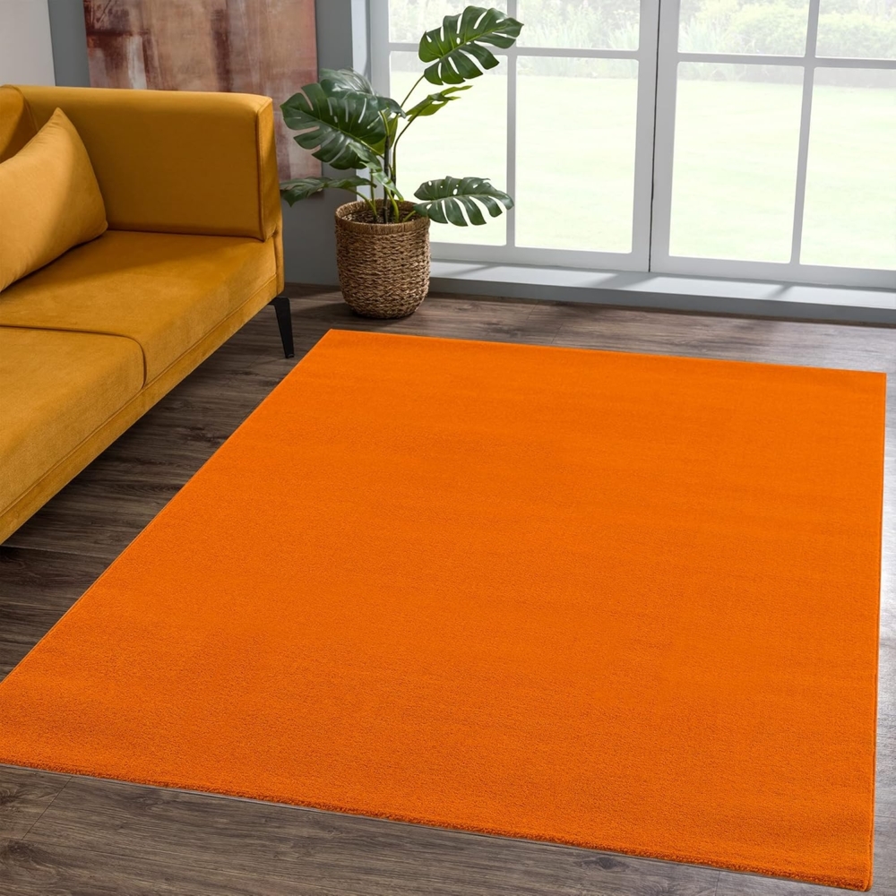 SANAT Kurzflor Teppich Wohnzimmer - Uni Modern Teppiche fürs Schlafzimmer, Arbeitszimmer, Büro, Flur, Kinderzimmer und Küche - Orange, 140x200 cm Bild 1