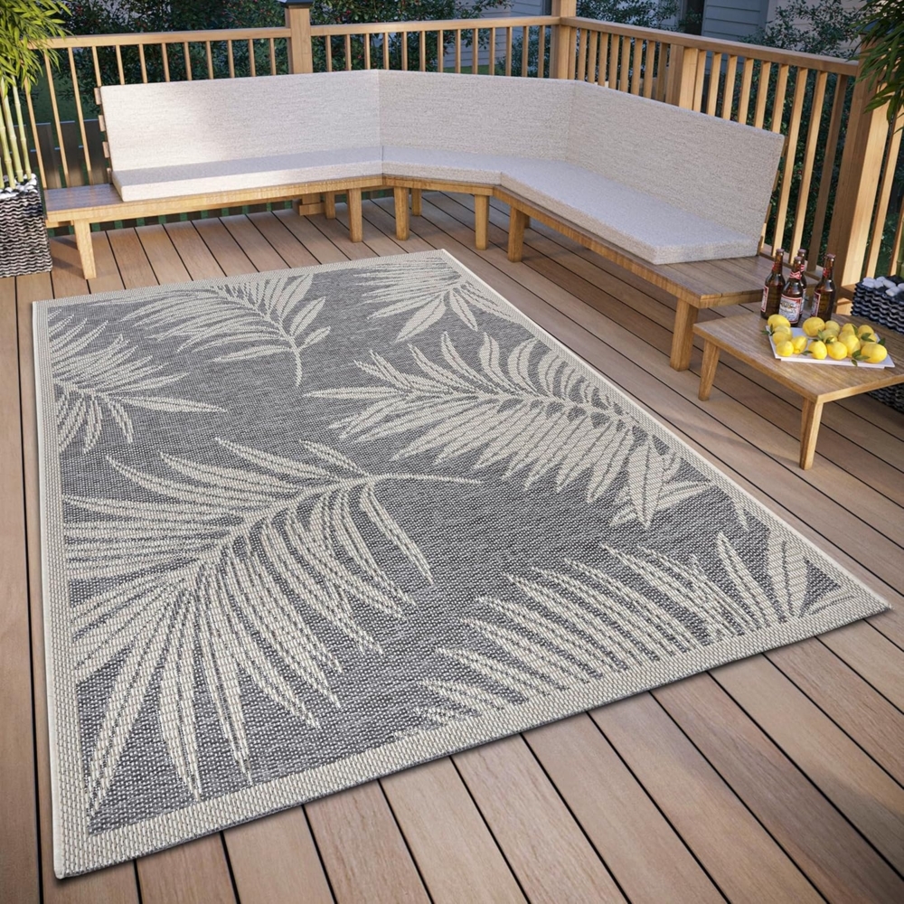 Hanse Home Paru Outdoor Teppich Wetterfest – Modernes Palmen Muster Florales Design, Wasserfest robuster Aussenteppich Flachgewebe für Garten, Balkon, Terrasse, Wohnzimmer – Grau Creme, 115x170 cm Bild 1