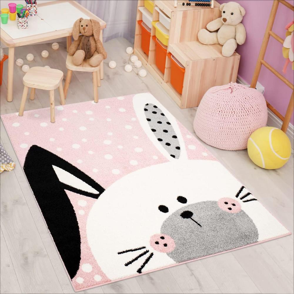 carpet city Kinderteppich Bubble Kids Flachflor Schlappohr-Hase, weiß gepunktet in Rosa für Kinderzimmer; Größe: 140x200 cm Bild 1