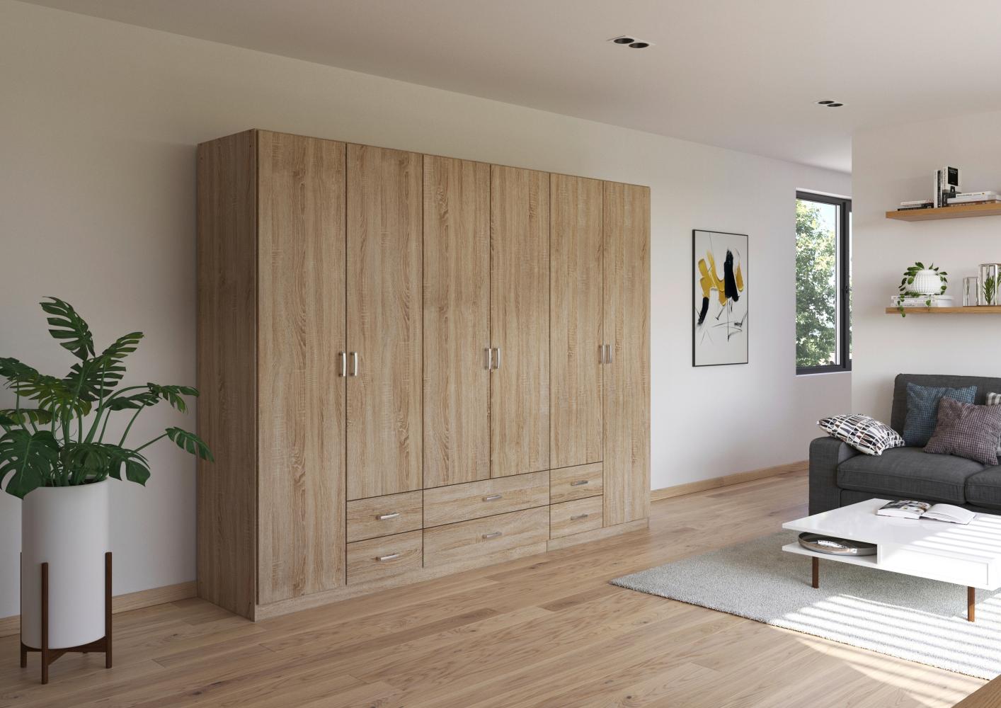rauch Kleiderschrank, Drehtürenschrank GAMMA, 6-türig, 6 Schubkästen, Eiche Sonoma, 271 x 210 x 54 cm Bild 1