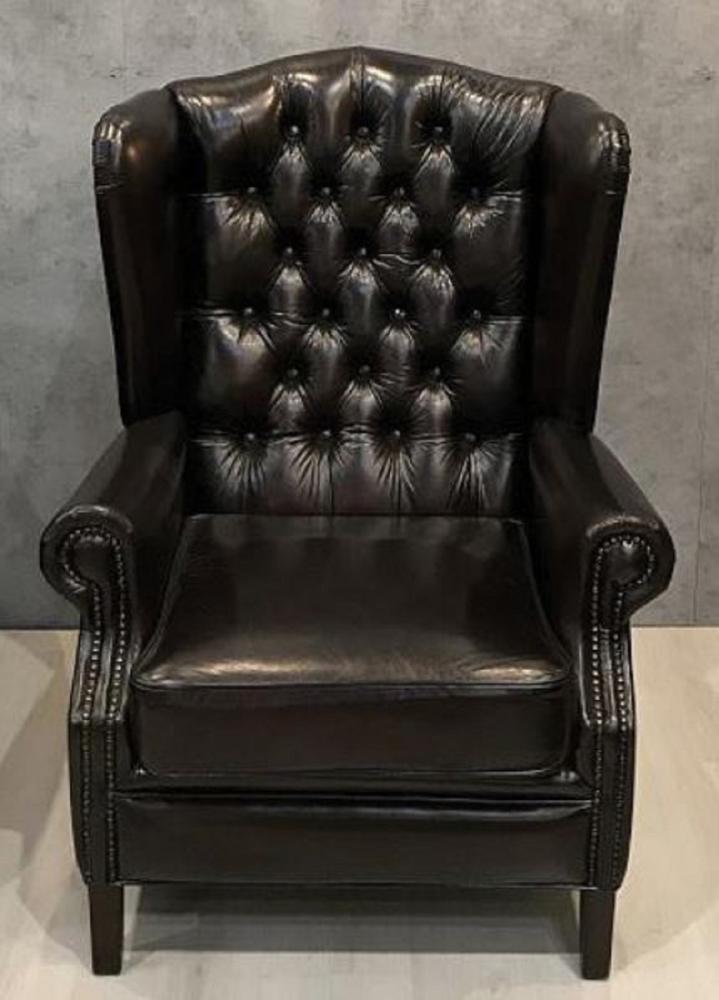 Casa Padrino Luxus Chesterfield Leder Ohrensessel Schwarz - Chesterfield Echtleder Wohnzimmer Sessel - Wohnzimmer Möbel - Chesterfield Möbel - Echtleder Möbel - Luxus Möbel - Luxus Einrichtung Bild 1