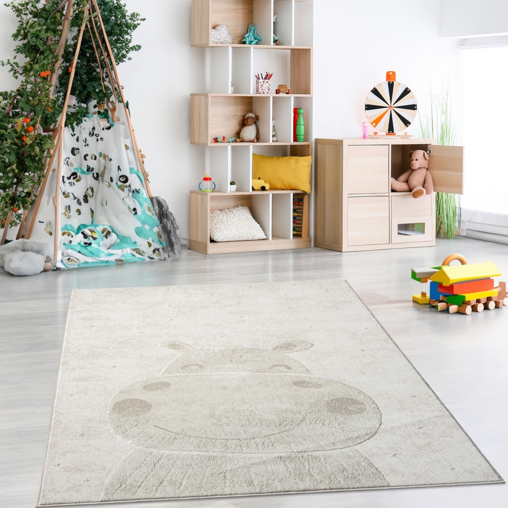 Teppich Kinderzimmer 120x160cm - Pastell Beige Creme - Kurzflor Spielteppich mit niedlichem Nilpferd Motiv Bild 1