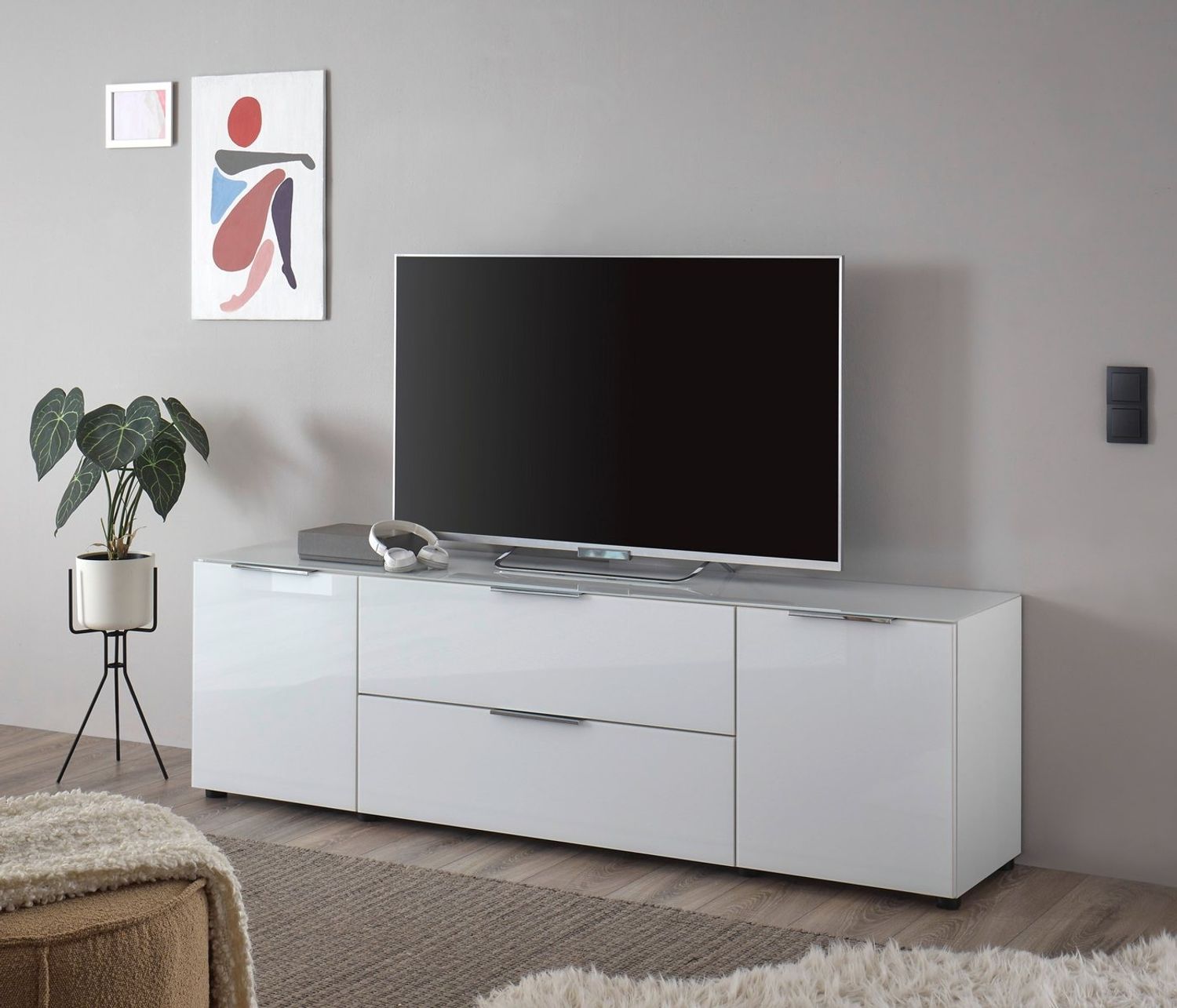 Stella Trading TV-Lowboard Santorin in Weiß, TV - TV Schrank für TV bis 65 Zoll mit viel Stauraum für Ihr Wohnzimmer - 180 x 55 x 40 cm (B/H/T) Bild 1