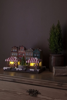 KONSTSMIDE Weihnachtsstadt Weihnachtsdeko, LED Fiberoptikhaus mit Stadtszene und rotierendem Weihnachtsbaum