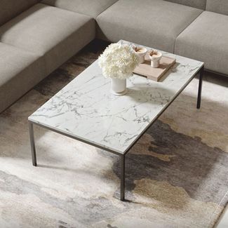 Casa Padrino Luxus Couchtisch mit Marmorplatte Weiß / Schwarz 120 cm - Luxus Möbel