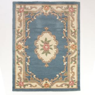 Kadima Design Traditioneller Wollteppich "Beauly" mit Handgeschnitzten Details. Farbe: Blau-Beige, 120x180 cm