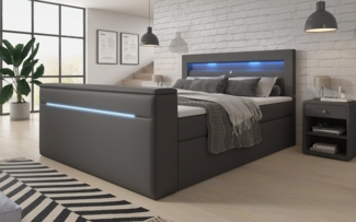 Luxusbetten24 Boxspringbett Repos, mit TV Lift, USB und LED