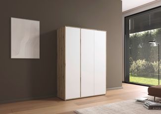 rauch Kleiderschrank Nabila, Drehtürenschrank, Garderobenschrank, 3-türig, mit 1 Kleiderstange und 3 Einlegeböden, Farbe Weiß/Eiche Artisan, Holz, mit Push-to-Open Funktion, 140x194x53cm