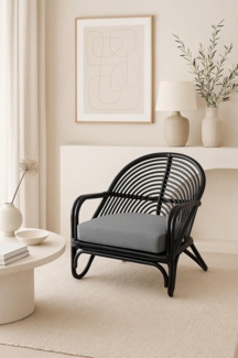 Relax-Sessel aus Rattan handgeflochten, schwarz lackiert, inkl. Kissen