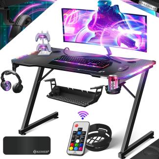 KESSER® Gaming Tisch LED | Z-Form Gamer Schreibtisch | Kopfhörerhaken & Kohlebeschichtung | Ergonomischer PC Computertisch | Stabiler Tisch mit Mauspad & Getränkehalter 120 x 60 cm, Schwarz Carbon mit LED