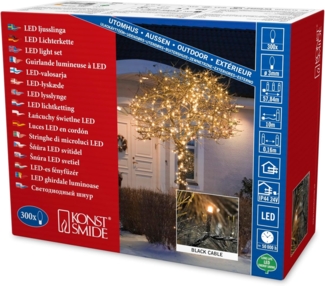 Konstsmide Micro LED Lichterkette, 300 bernsteinfarbene Dioden, 24V Außentrafo, schwarzes Kabel - 3616-800, Bernstein