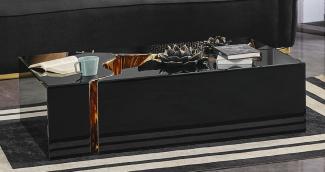 Casa Padrino Luxus Couchtisch Schwarz / Gold 110 x 70 x H. 43 cm - Rechteckiger Wohnzimmertisch - Wohnzimmer Möbel - Luxus Möbel - Luxus Einrichtung - Wohnzimmer Einrichtung