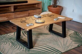 SAM® Couchtisch Flower, massives Akazienholz, Trapezgestell aus Metall in schwarz, Baumkante