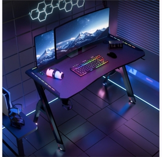 Rhein Beleuchtung Schreibtisch Gaming-Schreibtisch 140×60 cm mit RGB-LED & Zubehör (1-St, P2-Spanplatte, kaltgewalzter Stahl, verstellbare Füße, schwarz), Ergonomische Carbon-Tischplatte, Kopfhörer- & Getränkehalter