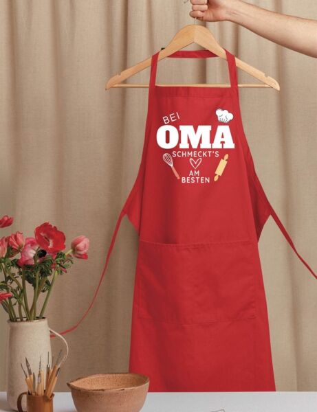 Youth Designz Grillschürze Damen Schürze "Bei Oma schmeckt es am Besten" Print Kochschürze, mit lustigem Spruch & Logo Aufdruck