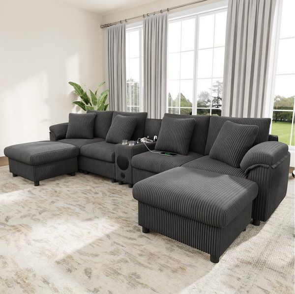 OKWISH Wohnlandschaft 315,5x84,5x144 cm U/L‑förmiges Cord‑Sofa mit Bluetooth & Konsole, Inklusive Kissen, Farbe Grau 1 Teile, Stauraum, Wireless Charging, USB & Getränkehalter